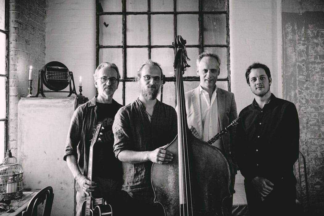 The Dime Notes 3 The Dime Notes publicity shot black and white